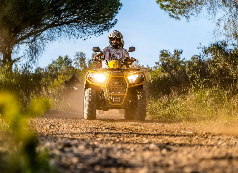 Off-road quad bike on trails through the Algarve hills